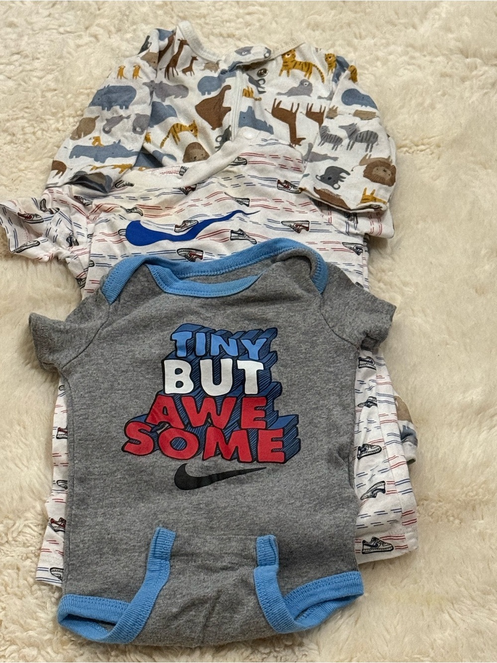 Nike Gray Baby One-Piece Bodysuit with Blue Trim and Red/Blue Graphic
